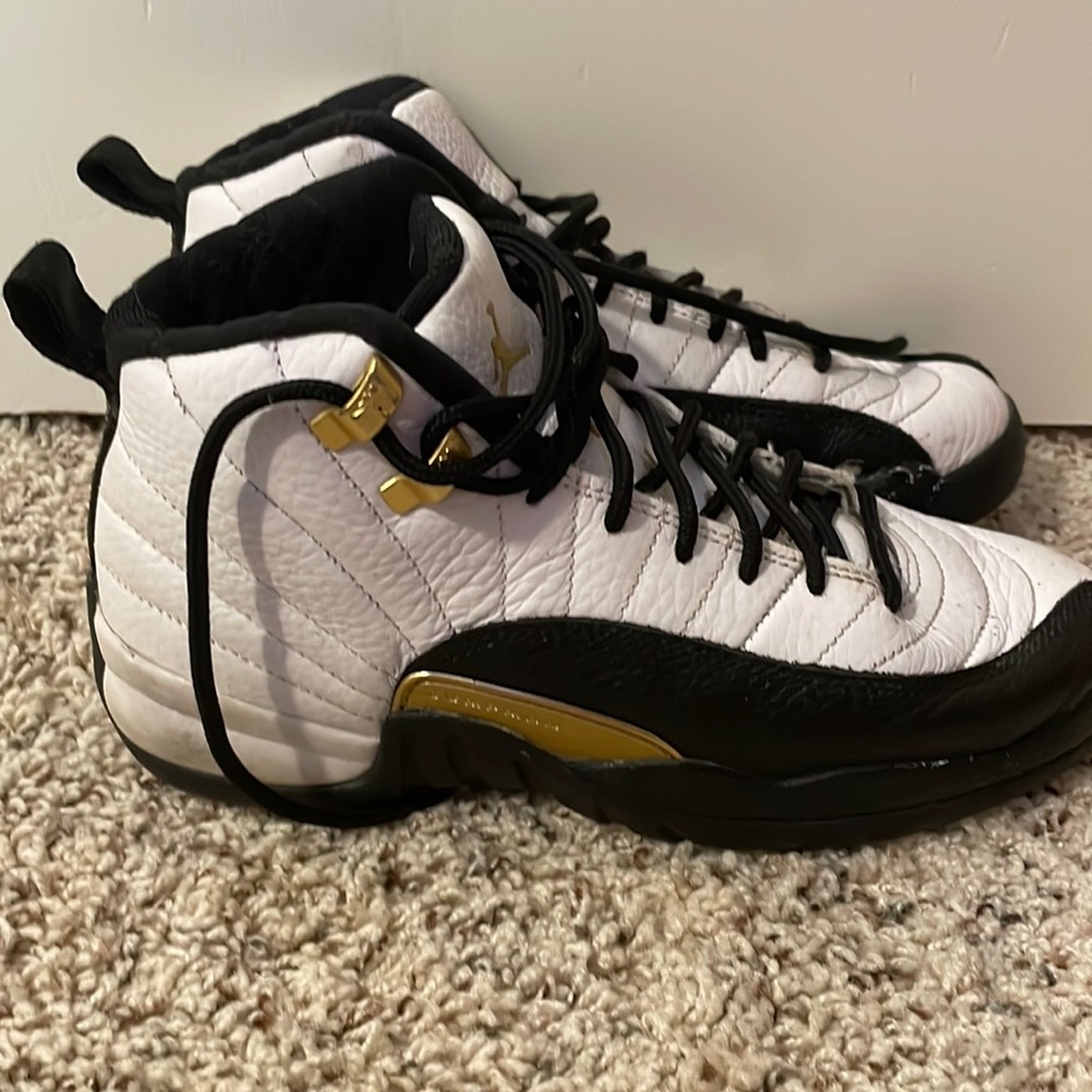 There Jordan’s ,size3.5 ,color is black and white and gold